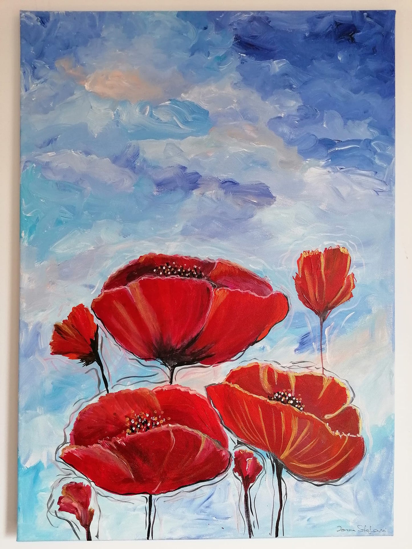 Maci sub cerul albastru